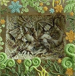 「パフのいる森」 ポール&マリーの「Puff The Magic Dragon」をテーマに、2段のアクリル板に彫りました。