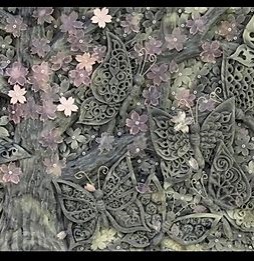 「夜桜と蝶」 桜の大木に、蝶が乱舞する様子を 墨入りマルセイユ石鹸に彫り、上に、市販の石鹸で彫った花びらを貼っています。